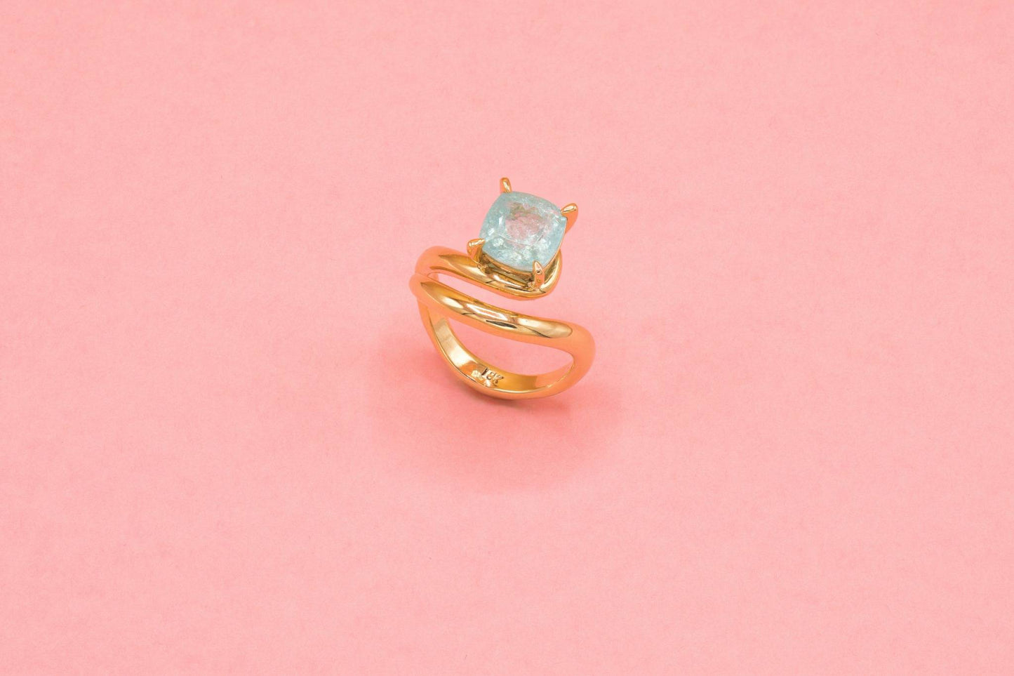 Golden ring with Paraiba stone