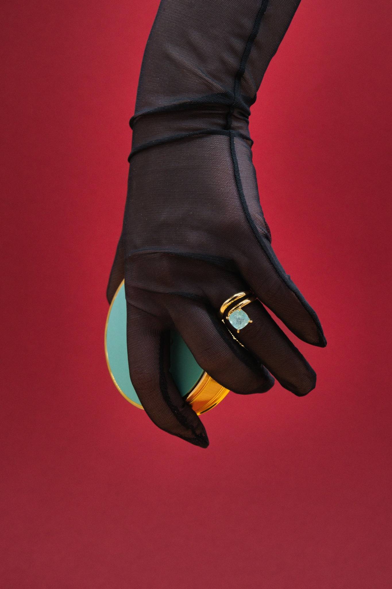 Golden ring with Paraiba stone