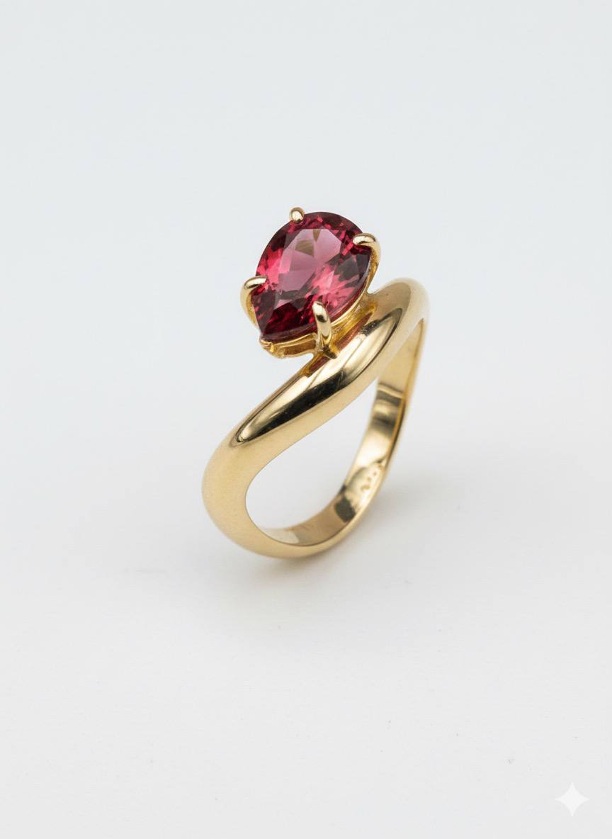 Wave ring with Rubellite Pear